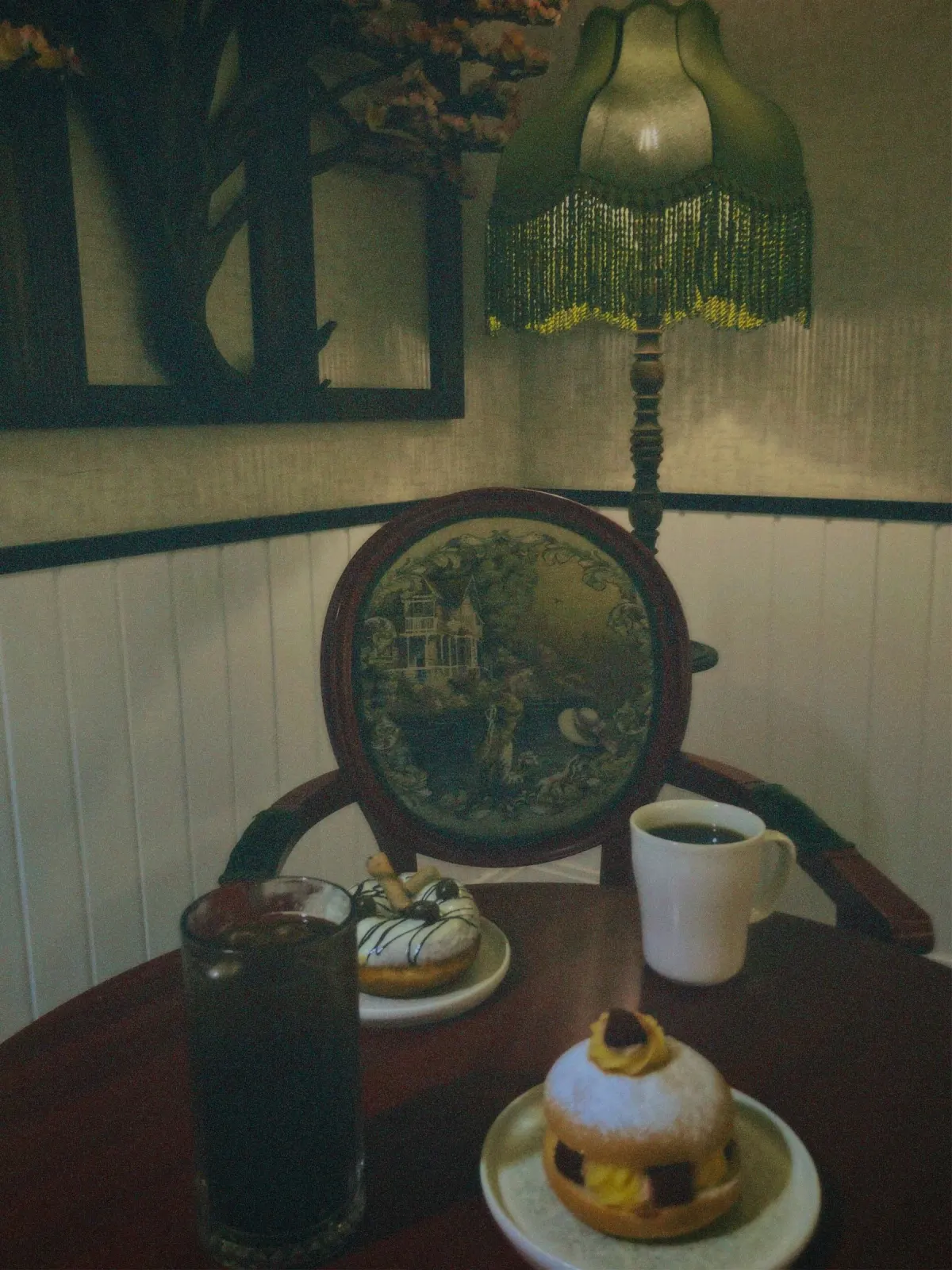 Coffee and pastries at a cosy cafe table