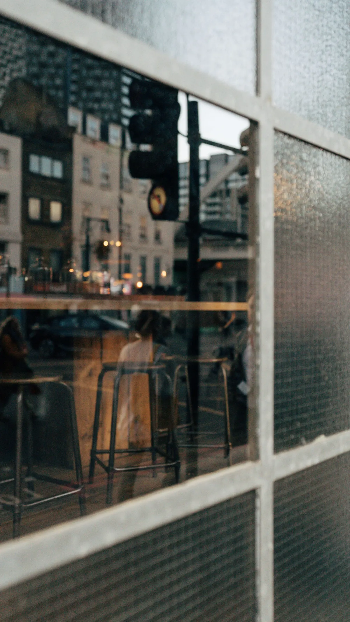 A quiet cafe window looking onto the street